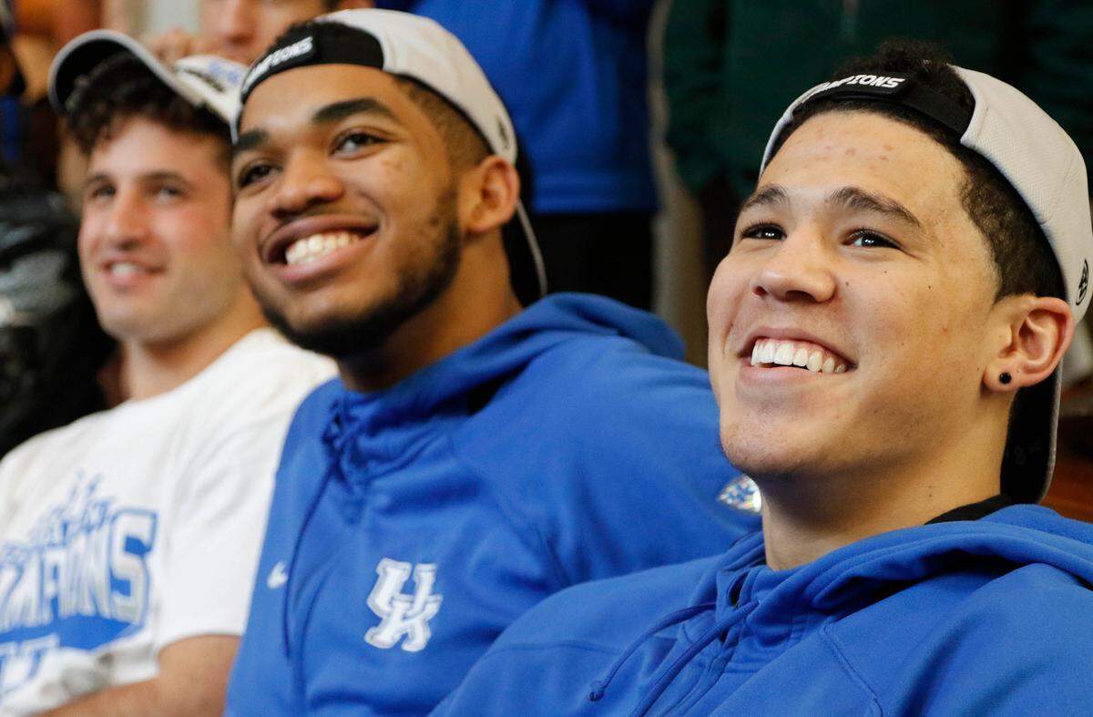 Former UK players Karl-Anthony Towns, center, and Devin Booker, right, reunited for an appearance on "Jimmy Kimmel Live!" in 2015.