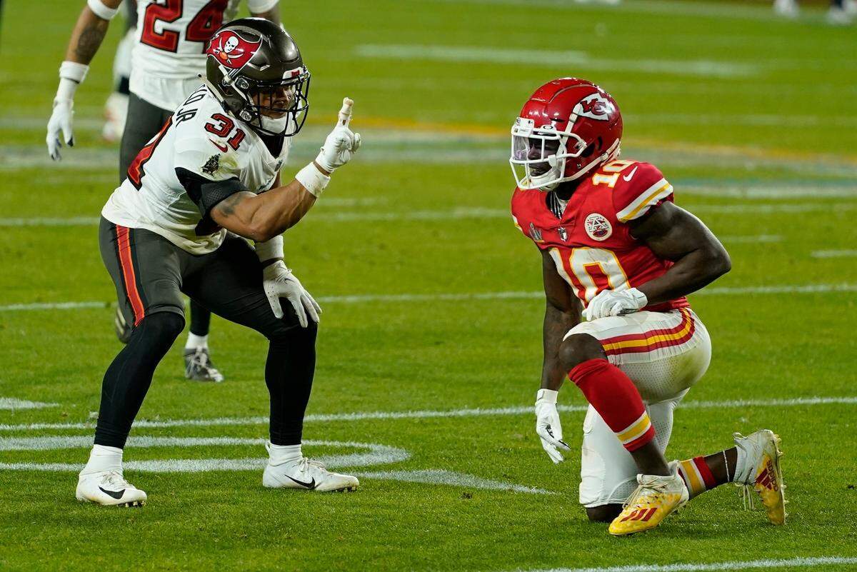 Tampa Bay Buccaneers strong safety Antoine Winfield Jr. taunts Kansas City Chiefs wide receiver Tyreek Hill after a play during the second half of the NFL Super Bowl 55 football game Sunday, Feb. 7, 2021, in Tampa, Fla.