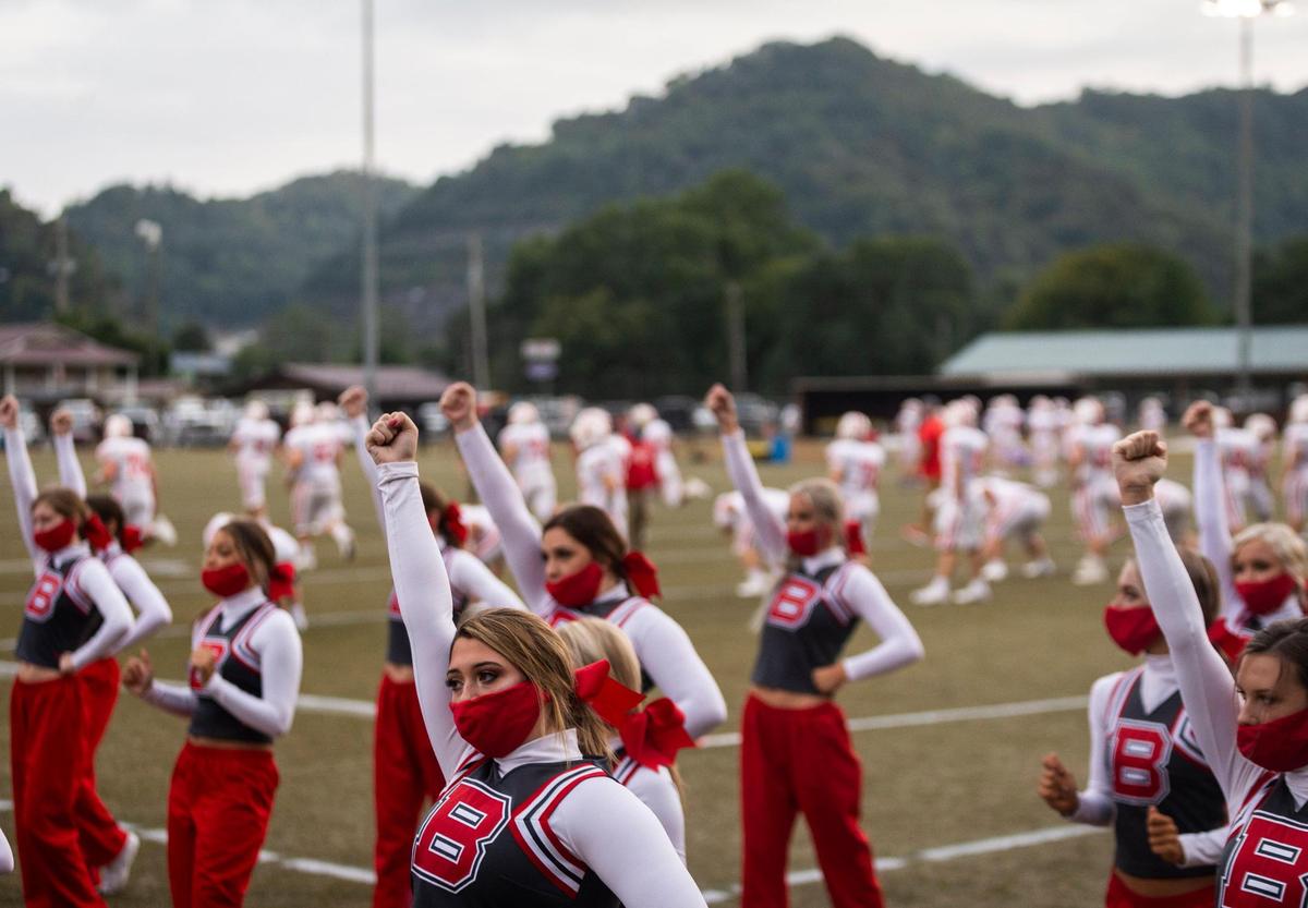 Belfry Pirates cheerleaders performed while their team warmed up before Friday's game against Pikeville.