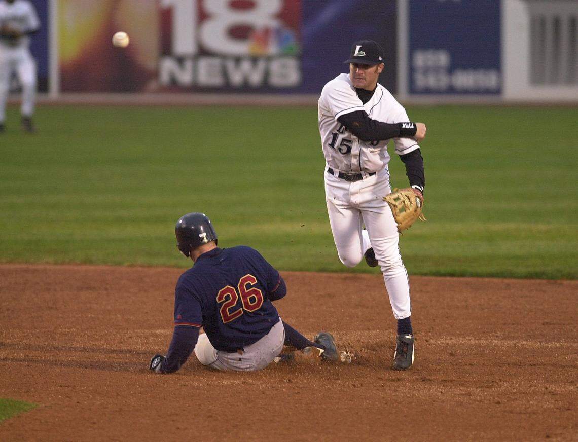 Brooks Conrad, right, played 38 games for the Lexington Legends in the early part of the 2003 season on his way to the majors where he had a six-year MLB career. He returns to Lexington this season as its manager.