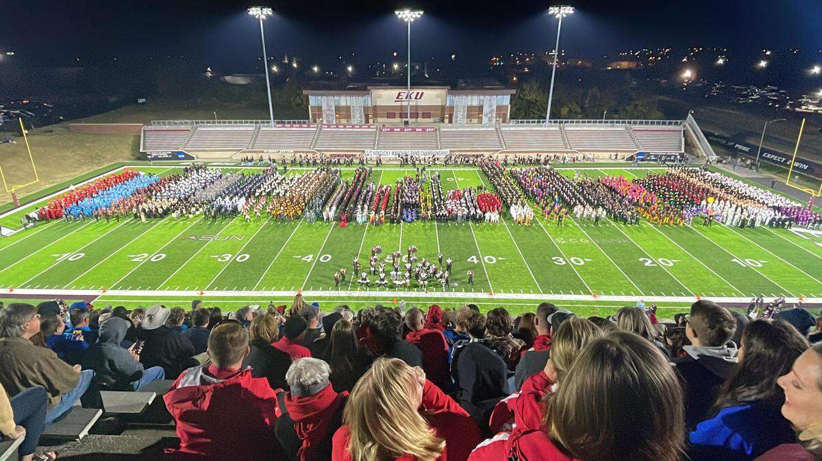 Participants in the Kentucky Music Educators Association line up to hear the final results for the Class 5A state championships. 