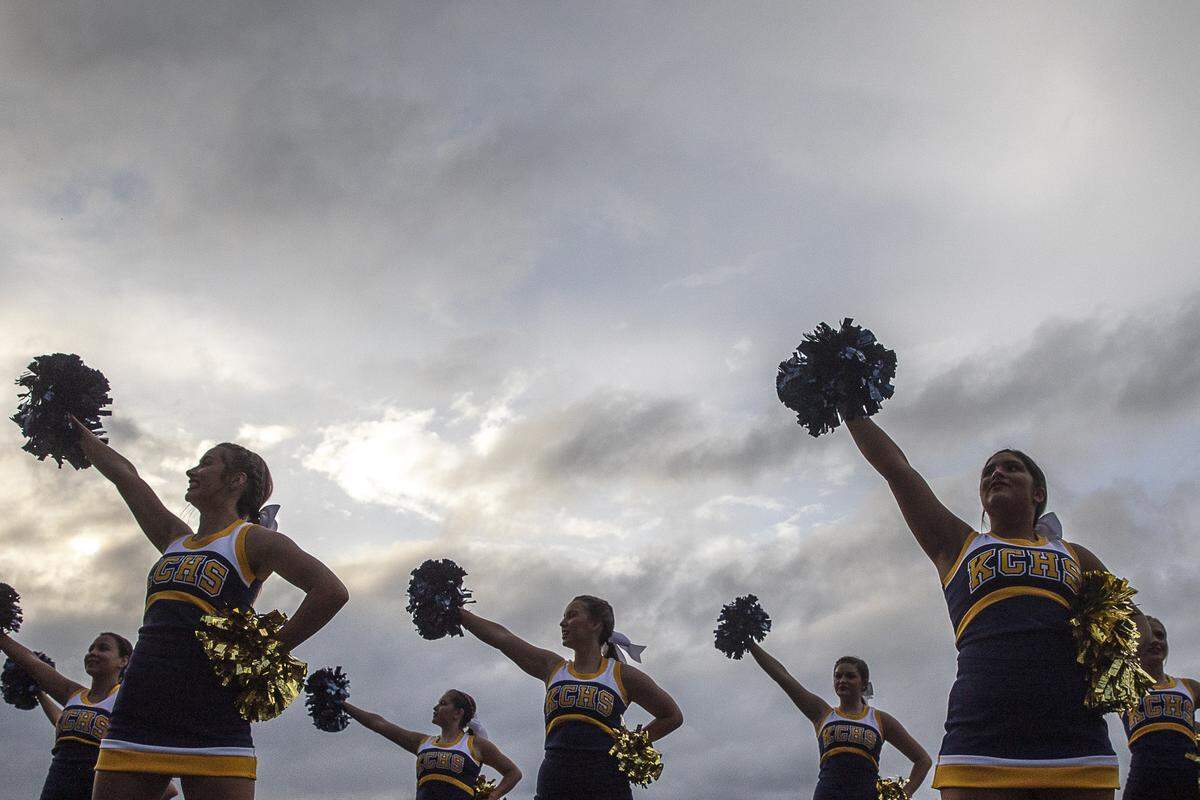 The Knox Central cheerleaders perform before the start of the Alumni Bowl.