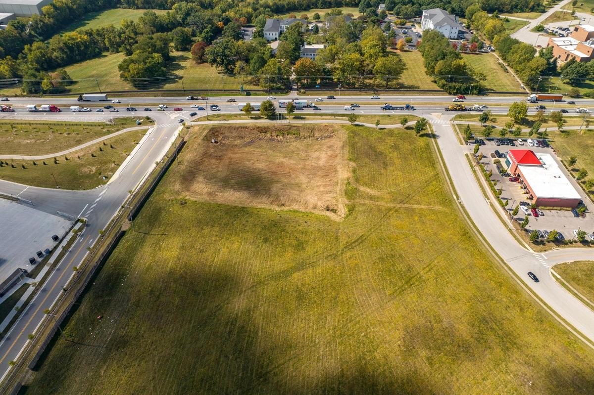A development plan has been filed for a new Kroger Marketplace at 760 Newtown Springs in Lexington, Ky. The plan calls for a gas station and liquor store as well as three other new buildings that would sit along Newtown Pike, top of photo.