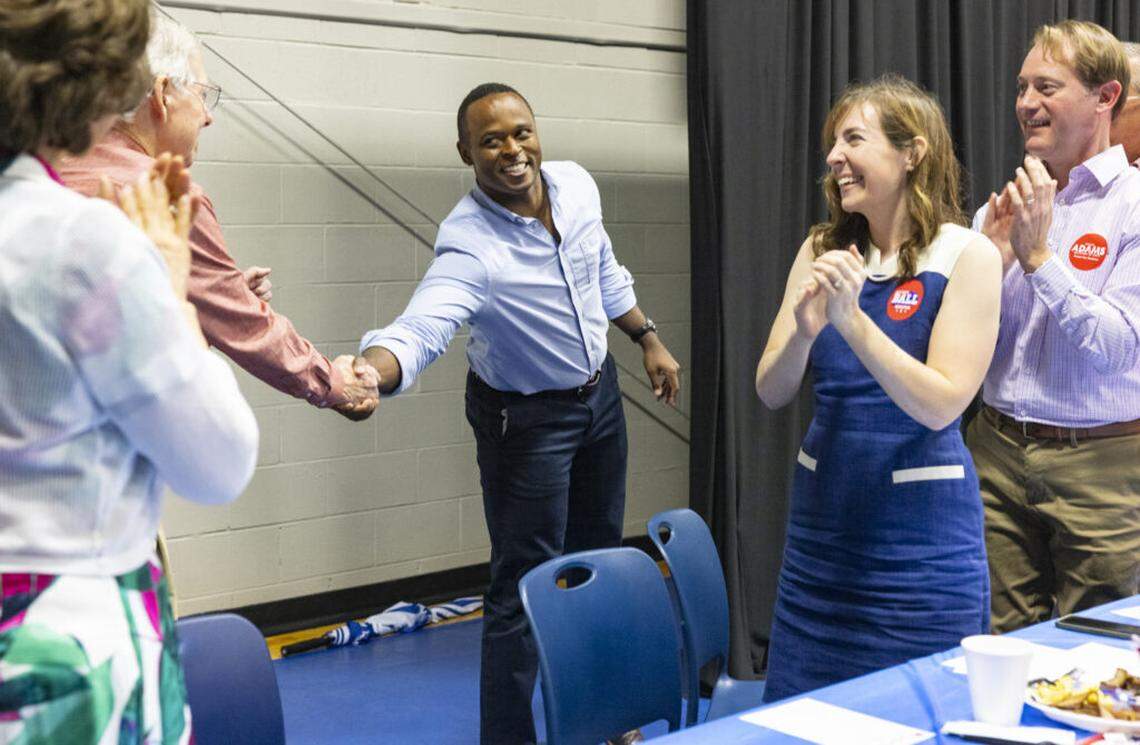 Then-Republican nominee for governor Daniel Cameron greets Sen. Mitch McConnell at the Graves County Republican Breakfast, Aug. 5, 2023. State Treasurer Allison Ball and Secretary of State Michael Adams look on. (Kentucky Lantern photo by Austin Anthony)