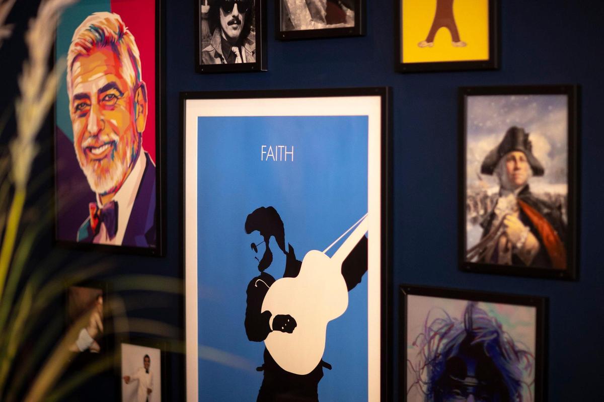 Art depicting famous Georges is displayed at Georgie’s Social House in Lexington, Ky., on Monday, April 24, 2023.