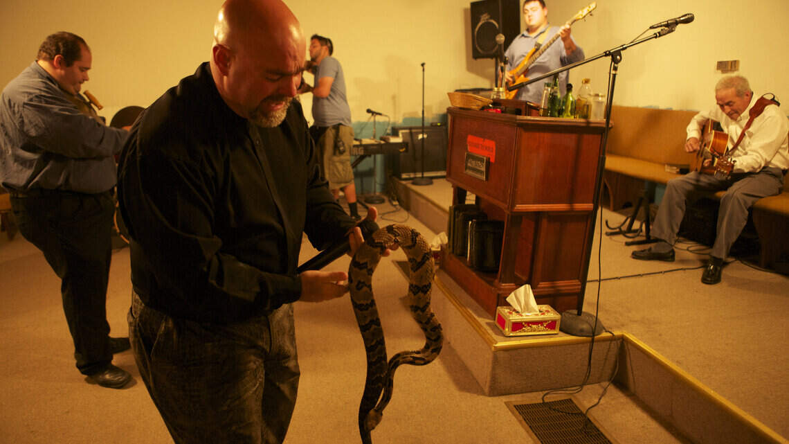 Snakebite death of Middlesboro pastor was quick, son says; medical treatment refused