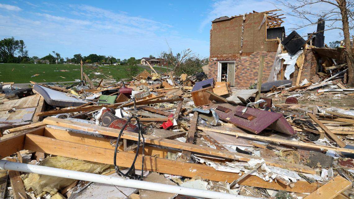 Damaged homes in the Sunshine Hills neighborhood, Sunday, May 18, 2025 in London, Ky. Two days earlier, a deadly tornado ripped through the neighborhood destroying homes.