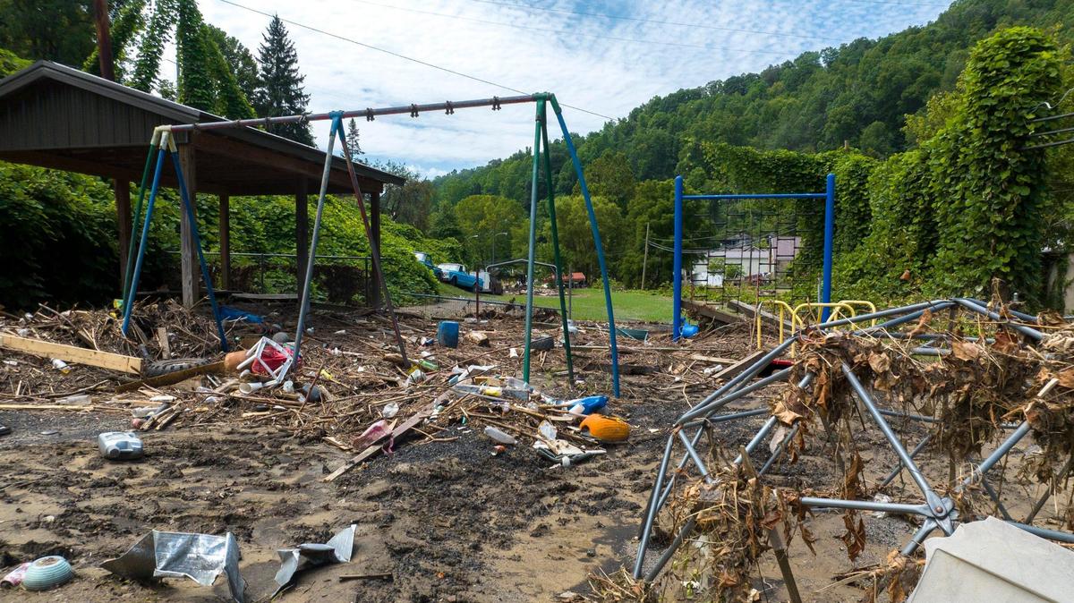 Mud and debris cover playground equipment at Neon City Park in Fleming-Neon, Ky., on Wednesday, Aug. 3, 2022.
