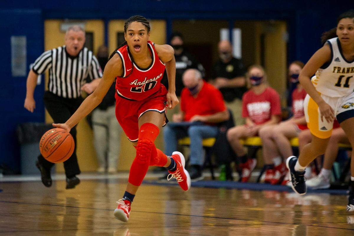 Anderson County’s Amiya Jenkins (20) steals the ball during a game against Franklin County this season. Both teams are in this week’s Sweet 16.