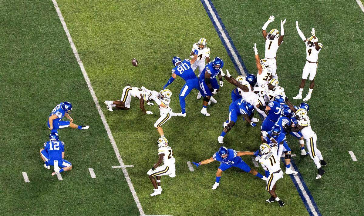 Kentucky place-kicker Matt Ruffolo (96) has a field goal blocked by Missouri linebacker Blaze Alldredge (25) earlier this season. Through seven games, UK has had three field goals and an extra point blocked.