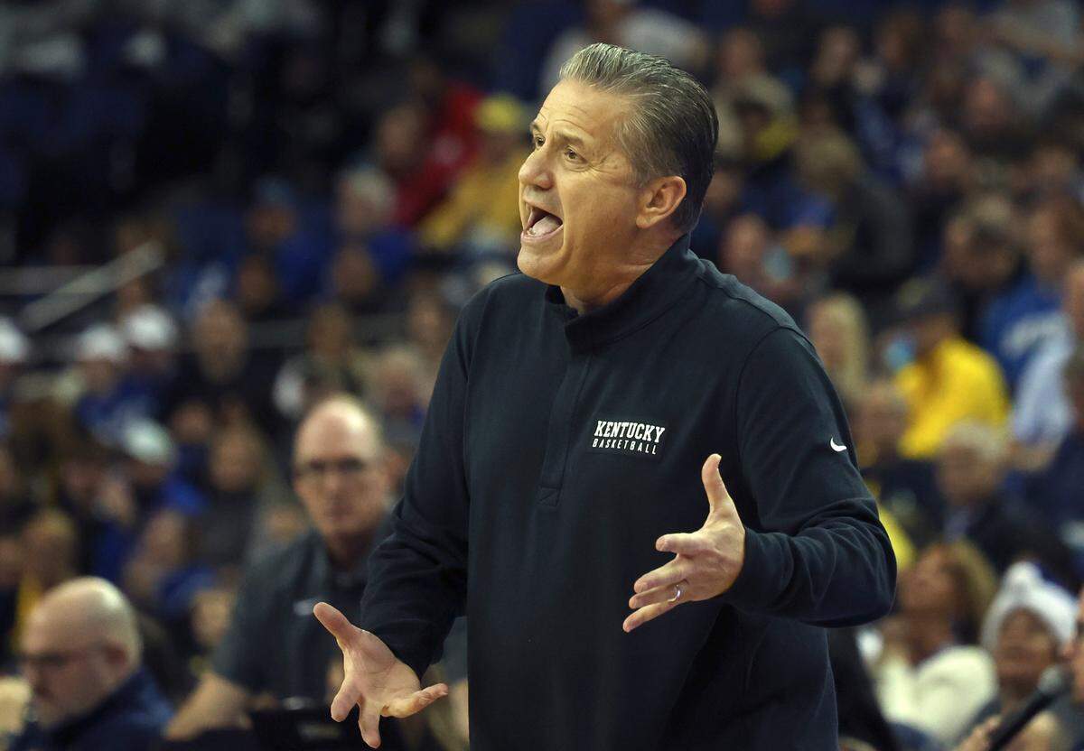 Kentucky head coach John Calipari communicates with his team during its game against Michigan at the O2 Arena in London, England, on Dec.4.