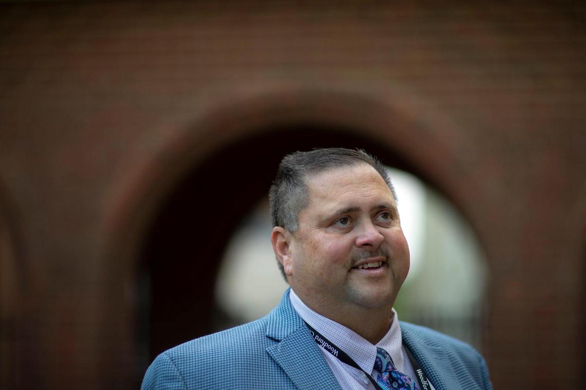 Woodford County Schools Superintendent Danny Adkins poses for a portrait outside a COVID-19 vaccination clinic at Versailles Presbyterian Church in Woodford County on Wednesday, Sept. 1, 2021. Woodford County has the highest vaccination rate in the state.