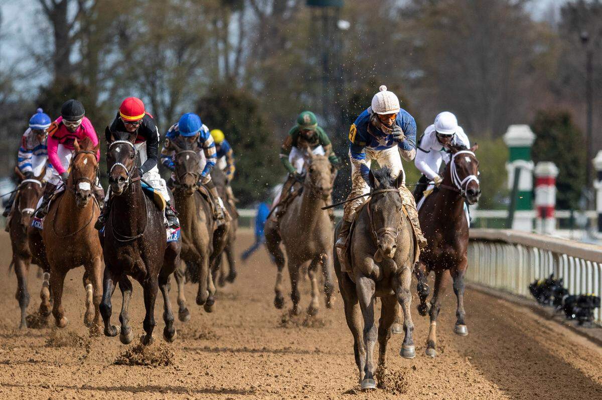 Zandon, with Flavien Prat up, cross the finish line to win the 98th running of the Toyota Bluegrass race during the second day of the Spring Meet at Keeneland in Lexington, Ky., Saturday, April 9, 2022.