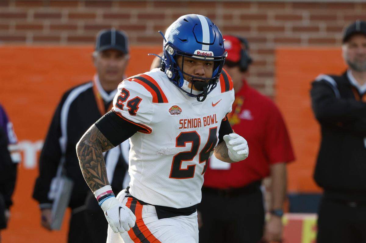 Former Kentucky football star Chris Rodriguez Jr. wore a purple face mask during the Senior Bowl as a tribute to his mother, who died in January after a battle with lupus.