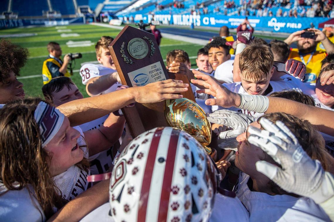 Pikeville players celebrate after defeating Russellville to win the 2021 Class A state championship game at Kroger Field in Lexington. It was the sixth state championship win for Pikeville.