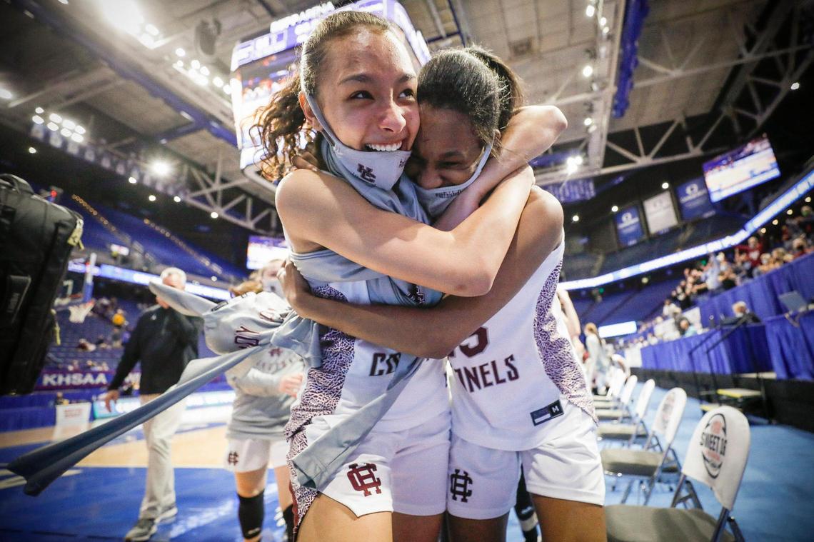 Henderson County’s Alexa Mullins (5) and Henderson County’s Kyra Dixon (25) celebrates after the KHSAA Girls’ Sweet 16 quarterfinals against Russell at Rupp Arena in Lexington, Ky., Friday, April 9, 2021. Henderson County beat Russell 64-53.