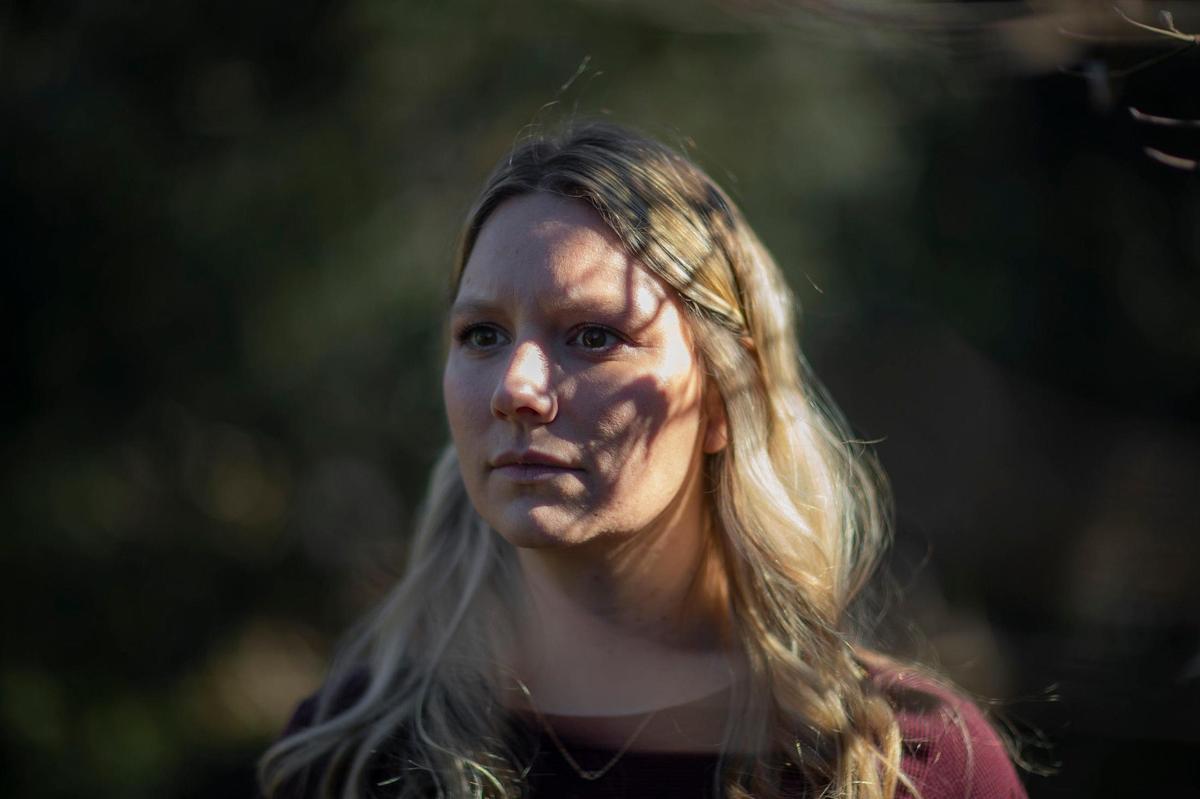 Amy English poses for a portrait outside her home in Lousivlle, Ky., on Friday, Feb. 3, 2023.