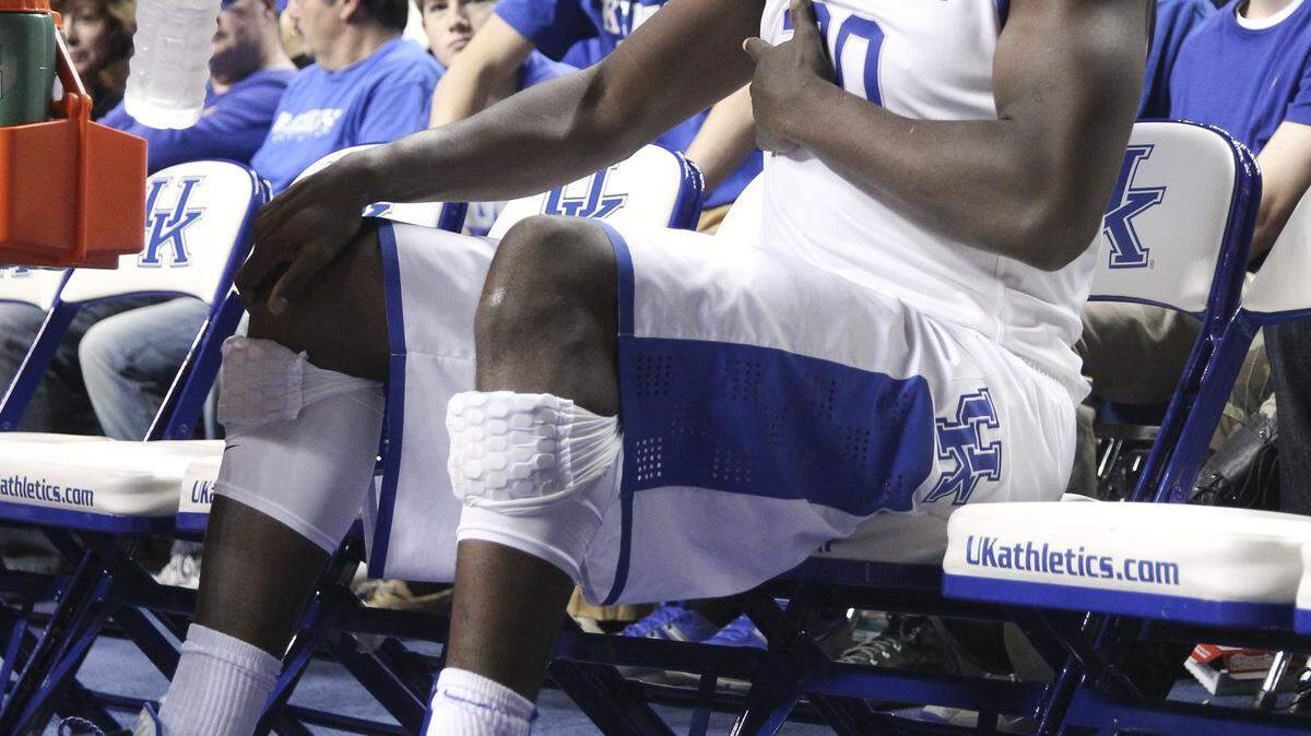 Kentucky forward Julius Randle missed a good portion of the Louisville game suffering from muscle cramps.