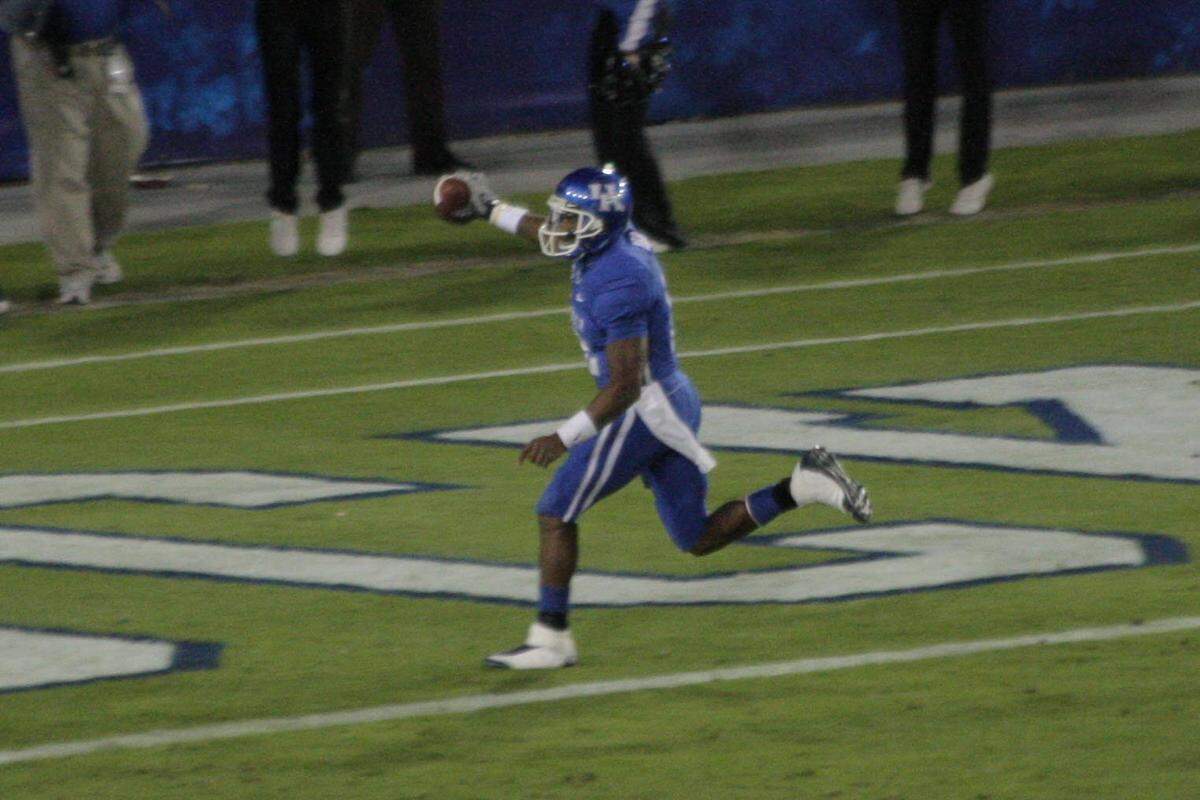 Randall Cobb scored the game-winning touchdown on a pass from Mike Hartline as Kentucky rallied to beat Arkansas 21-20 in 2008. It was UK's first victory over a Bobby Petrino-coached team after four losses (2003-2006) during Petrino's first stint as Louisville coach.