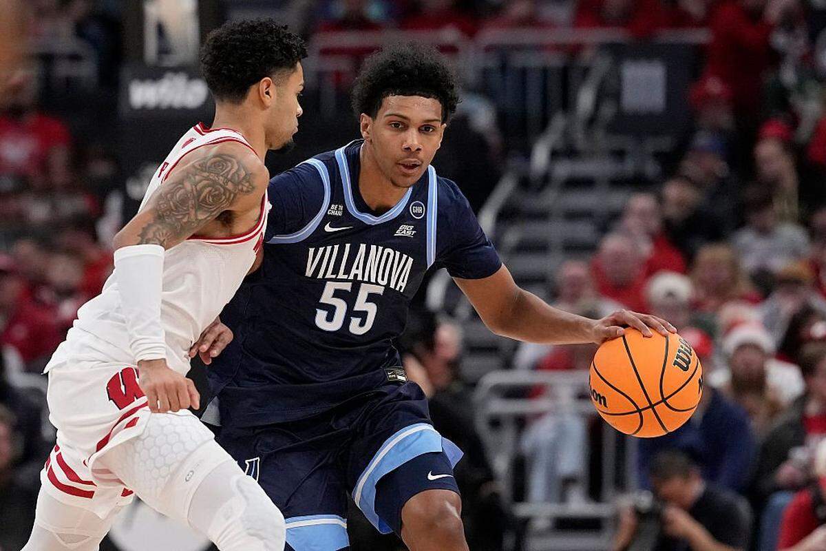 MILWAUKEE, WISCONSIN - DECEMBER 19: Acaden Lewis #55 of the Villanova Wildcats dribbles the ball against Nick Boyd #2 of the Wisconsin Badgers during the first half in the 2025 Milwaukee Hoops Showdown at Fiserv Forum on December 19, 2025 in Milwaukee, Wisconsin. (Photo by Patrick McDermott/Getty Images)