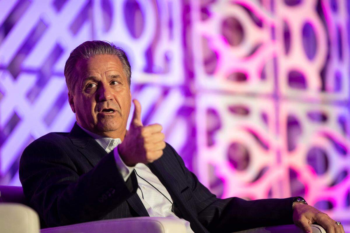 Kentucky head basketball coach John Calipari talks with Louisville head basketball coach Kenny Payne during the The Kentucky Chamber Annual Dinner at Louisville Marriott Downtown in Louisville, Ky., Wednesday, September 14, 2022.
