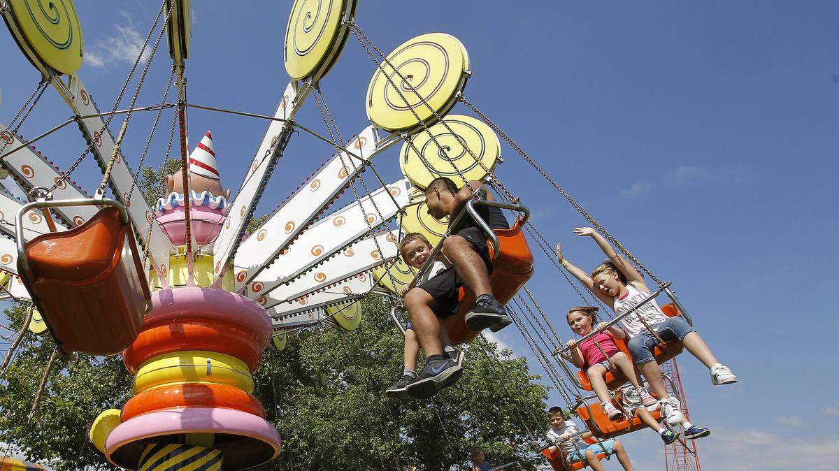 Kids on the swings at the Bluegrass Fair in 2017. The fair is at Masterson Station Park through July 22.