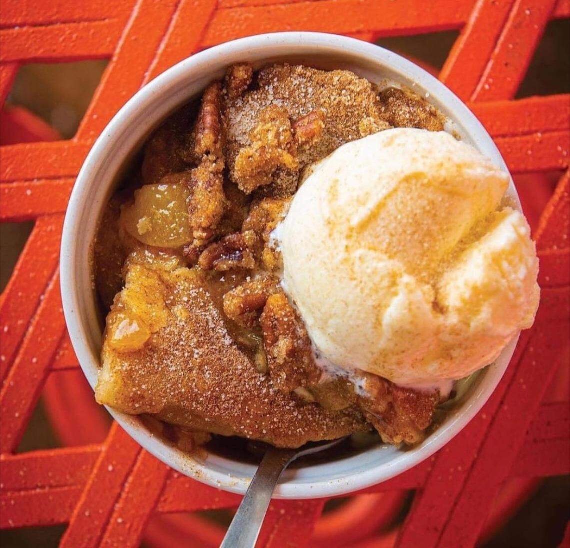 The Peach Cobbler Factory’s menu has a dozen warm cobblers, plus you can top them with ice cream.
