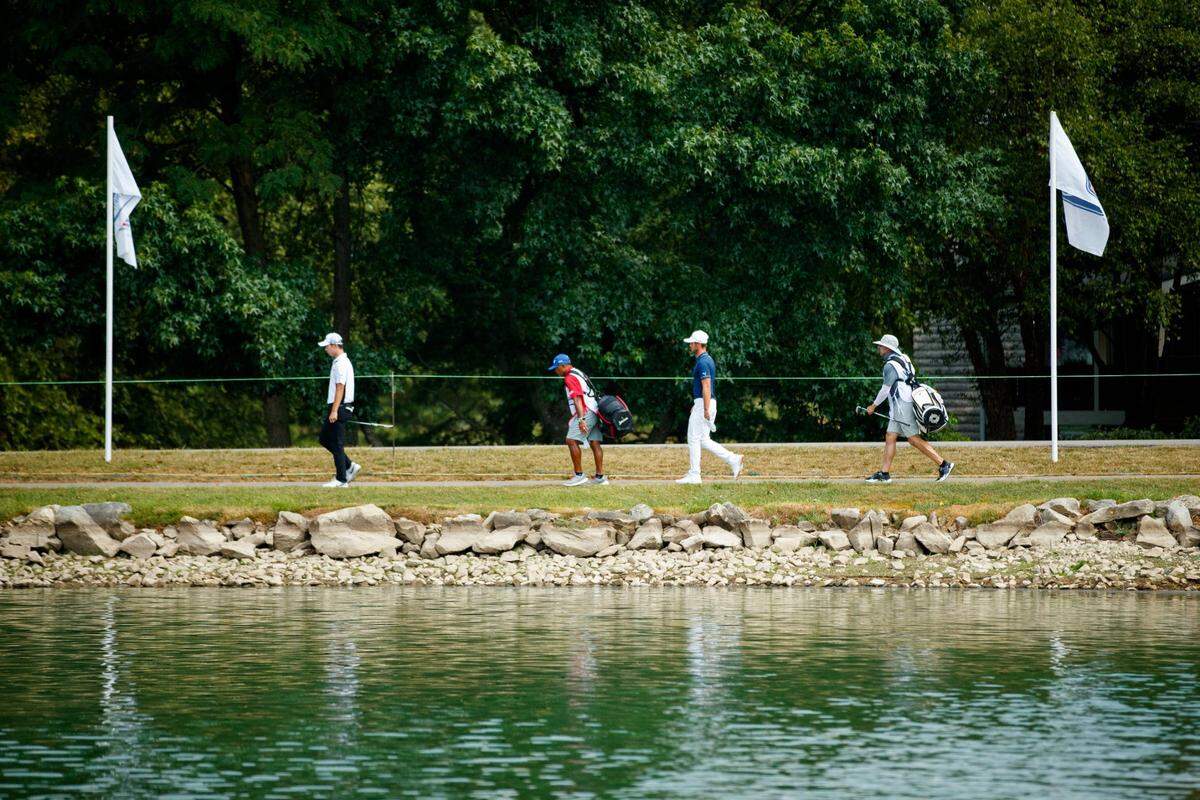 Seung-Yul Noh, left, and Adam Svensson, center right, walk to the No. 9 green during last year’s PGA Barbasol Championship in Nicholasville.