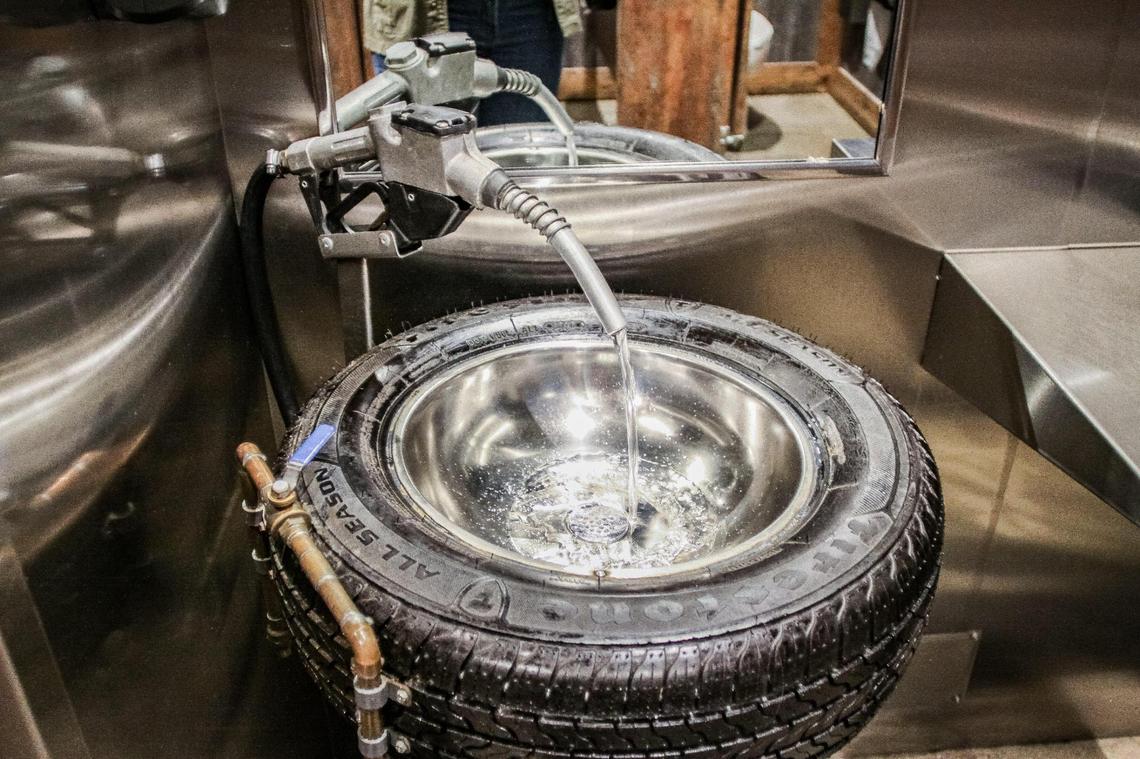 Even the bathrooms at Ford’s Garage restaurant’s have a touch of automotive feel with sinks made from tires and gas pump water faucets.