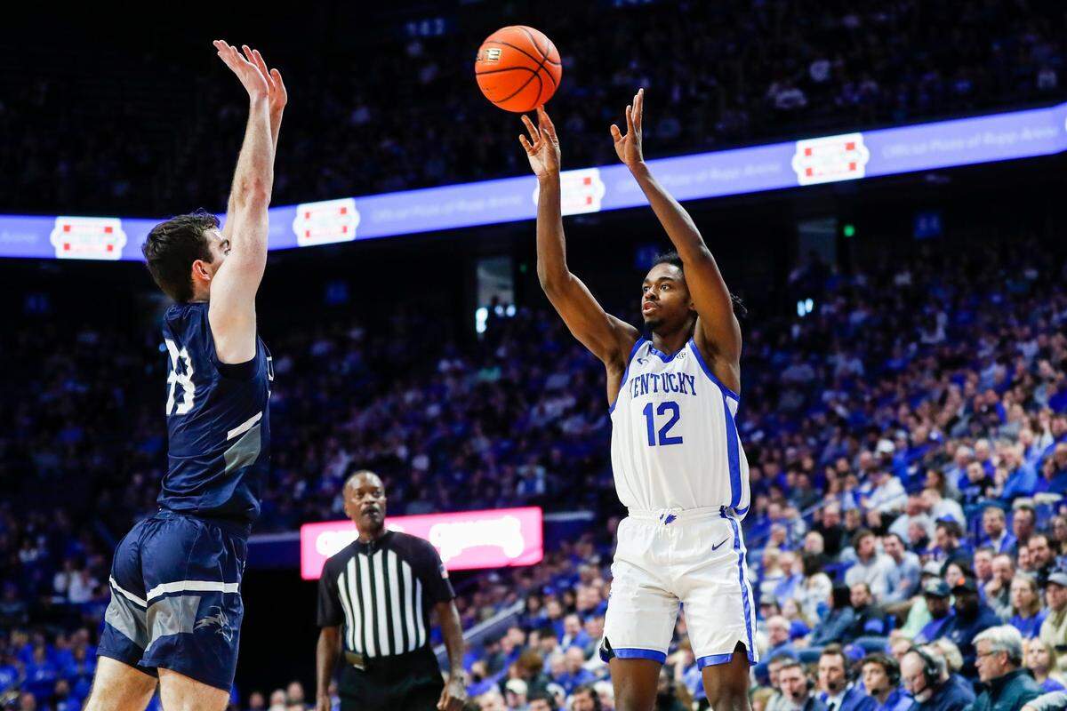 Kentucky guard Antonio Reeves (12) shoots a three-pointer against North Florida during Wednesday’s game at Rupp Arena. Reeves tied teammate Jacob Toppin for game-high scoring honors with 20 points.