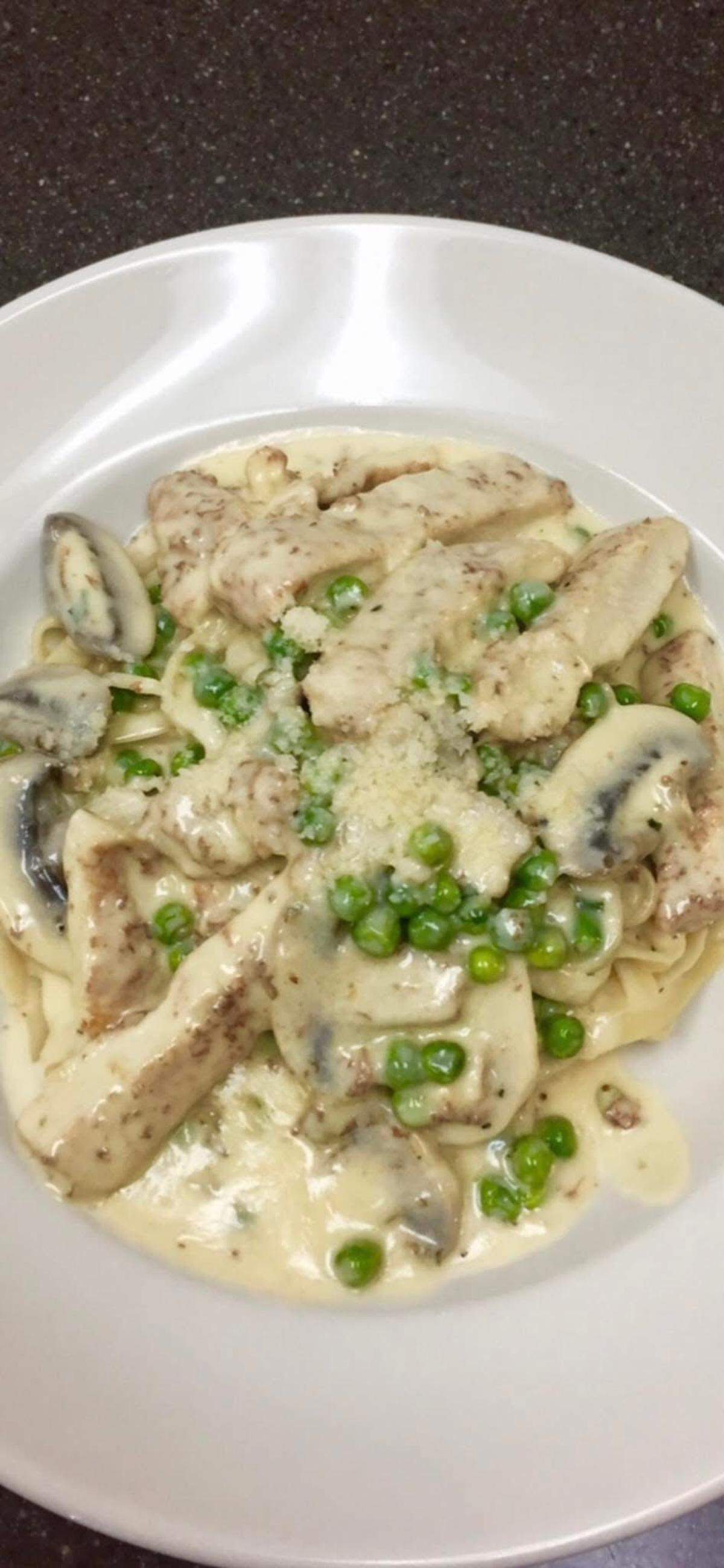 Pasta Milano at Milano Italian Restaurant, which is opening a new location in Georgetown, comes with freshly made fettucine noodles with sautéed chicken breast,mushroom, peas and Alfredo sauce ($18.99).