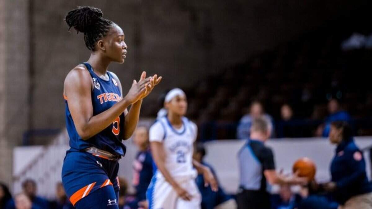 Auburn’s Aicha Coulibaly, who led all scorers with 20 points, celebrated during the Tigers’ victory over Kentucky in Memorial Coliseum on Thursday night.