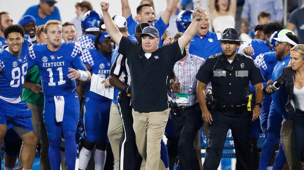 Kentucky Wildcats head coach Mark Stoops celebrates after defeating Florida Gators 20-13 during a game at Kroger Field in Lexington, Ky., Saturday, Oct. 2, 2021.