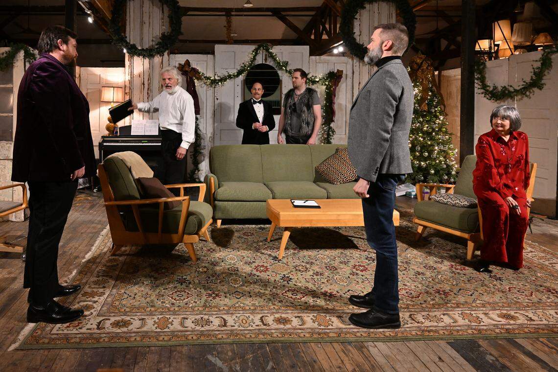 Philip (Nick Vannoy) and Henry (Kevin Hardesty) argue while Henry’s family — Geoffrey (Tim Hull), John (Tanner Gray), Richard (Shayne Brakefield) and Eleanor (Missy Johnston) — watch in the living room. On the Verge Theatre presents “The Lion in Winter” at Luigart Studio, 110 Luigart Court in Lexington, Kentucky, Jan. 23-Feb. 1. This photo was taken at a rehearsal Jan. 17, 2025.