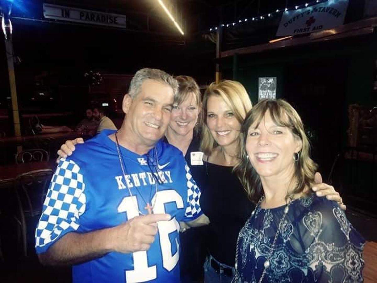 Juan Portela, who quarterbacked Kentucky to a 31-3 pasting of Florida in Gainesville in 1979, wore a Wildcats jersey bearing the No. 16 he wore at UK to the 40th reunion of his Coral Gables (Fla.) High School graduating class.