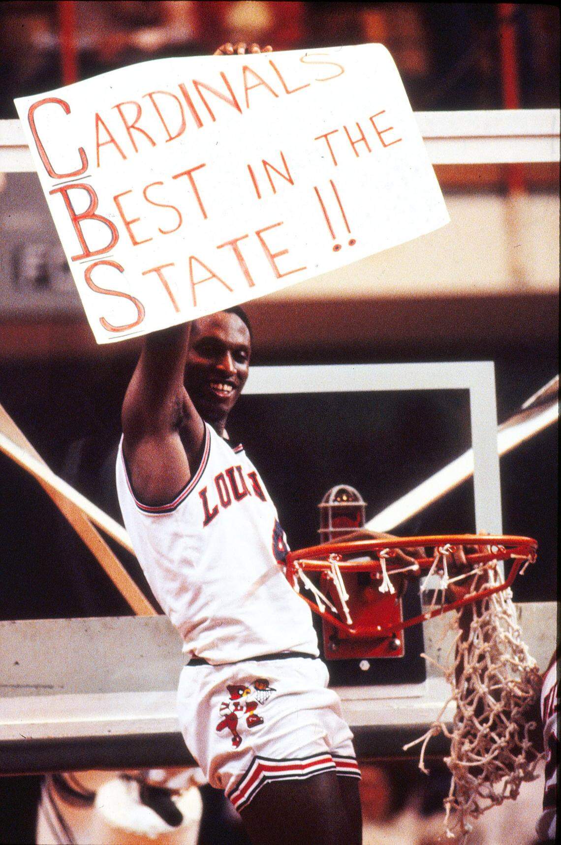 Louisville’s Lancaster Gordon celebrated after the Cardinals beat rival Kentucky 80-68 in overtime during the NCAA Mideast Regional Finals in Knoxville. After scoring 24 points, Gordon was named MVP of the Mideast Region.