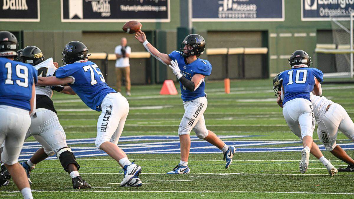 Lexington Catholic QB (1) Brady Wasik throws downfield during the Knight's 17-7 victory over Boyle County at Lexington Catholic High School on Friday. Wasik’s older brother Jackson also led the Knights to a win over Boyle at quarterback in 2022.