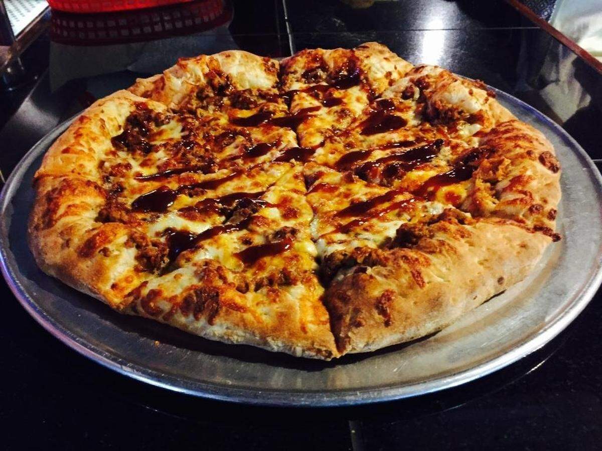 The Southeastern from Apollo Pizza with chicken, barbecue pizza sauce and onions.