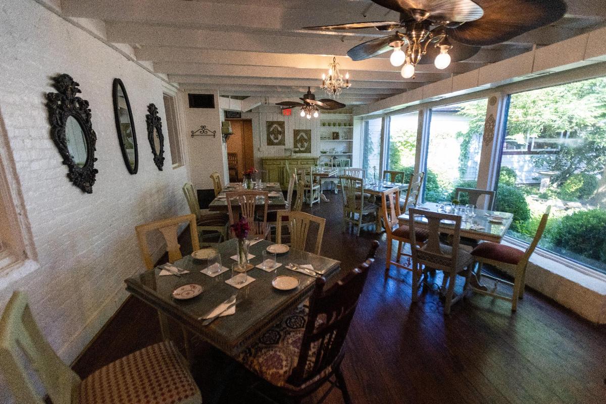Garden room of Remoulade restaurant, which opened in early 2022 on North Broadway and serves Cajun/Creole-French fusion food.