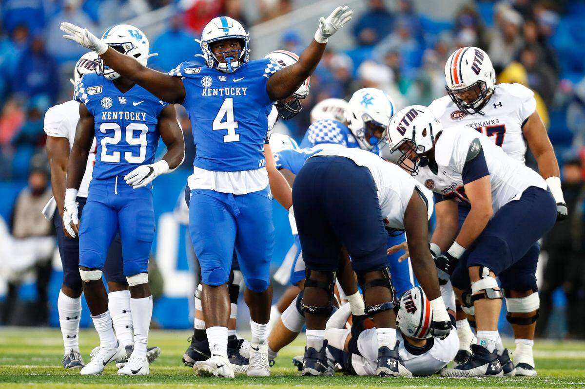 Josh Paschal (4) leads a Kentucky defense filled with “SEC-caliber players in that front seven,” Phil Steele said. “This defense, that looks like an SEC defense.”