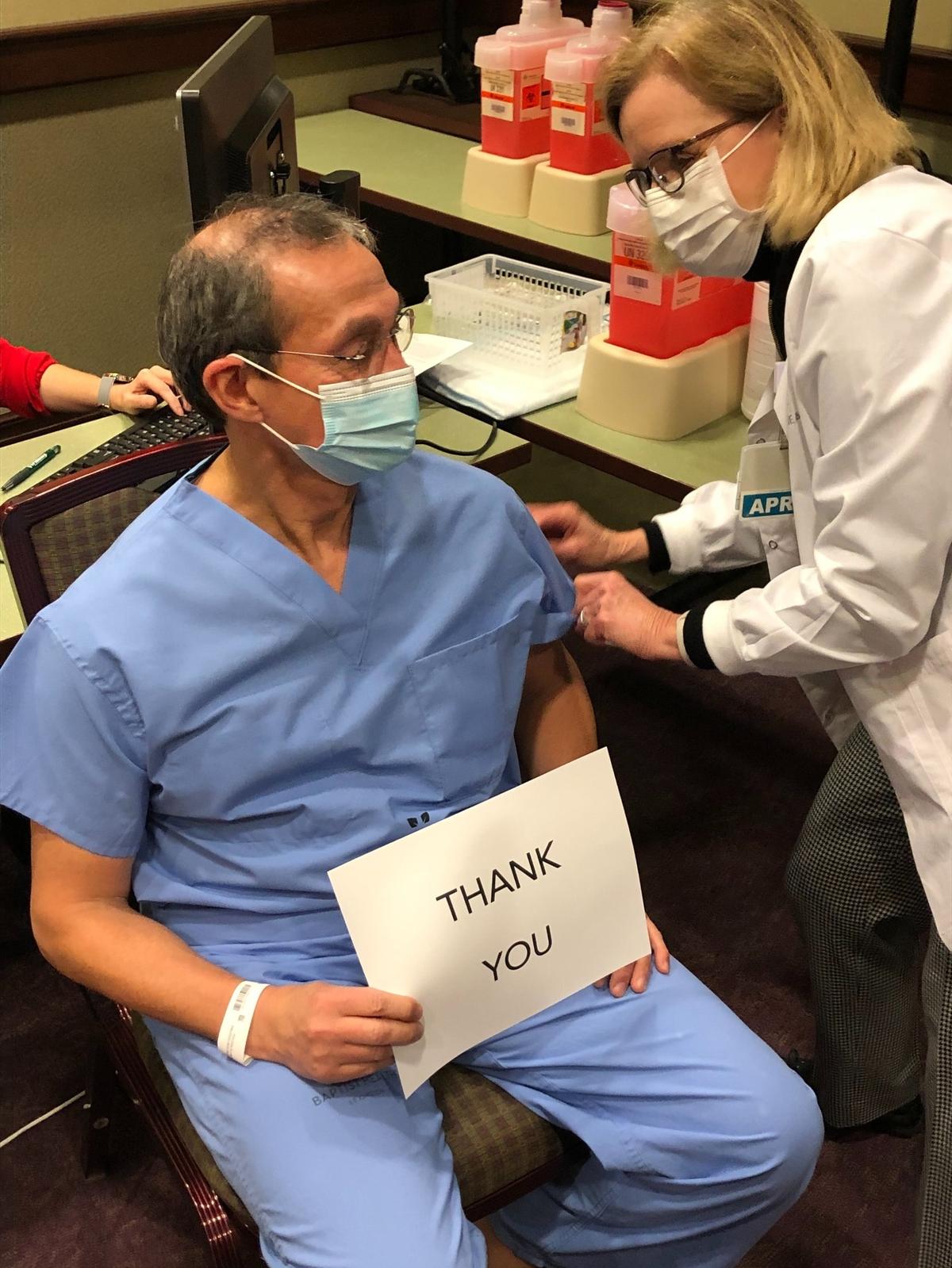 Dr. Yuri Villaran was one of five Baptist Health Lexington employees who received the first initial dose of the COVID-19 vaccine.