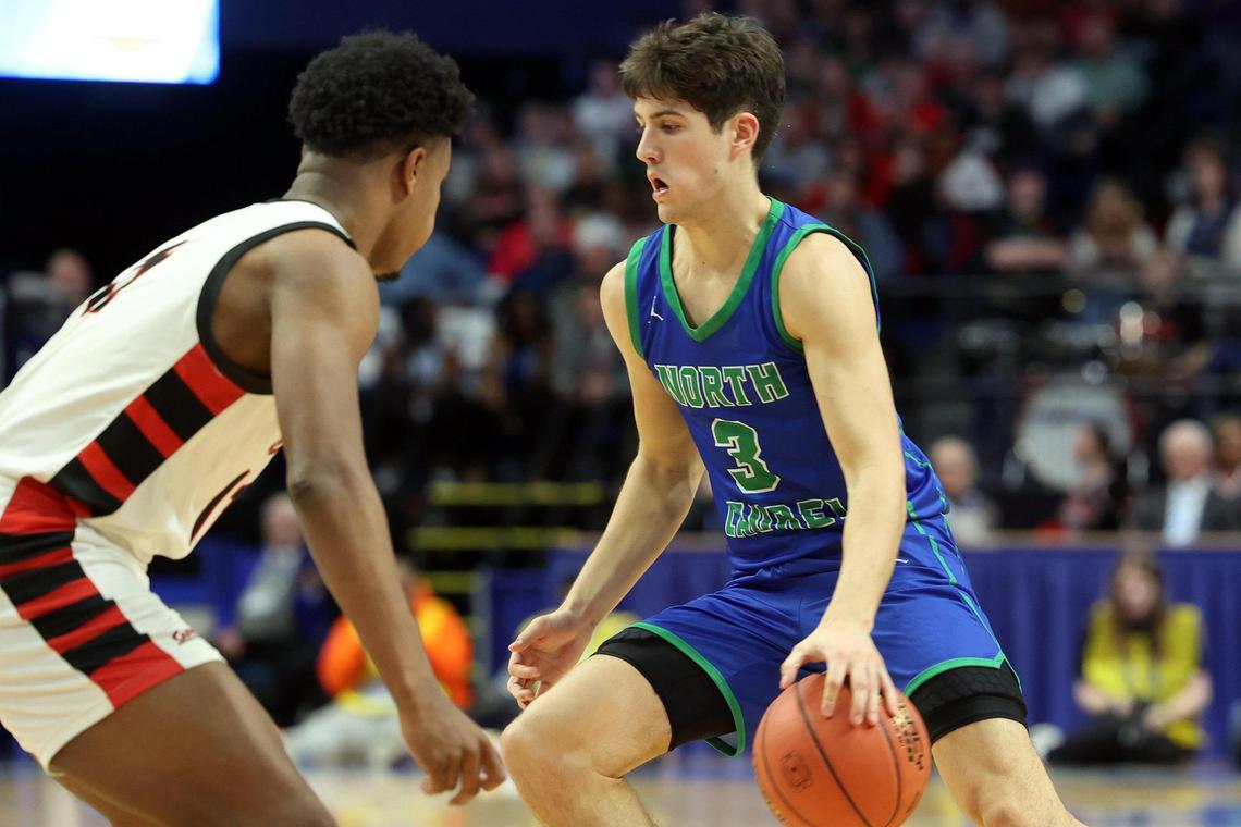North Laurel’s Reed Sheppard (3) drives against Jerone Morton (11) of George Rogers Clark during his final high school game Thursday night. Next season, Sheppard will be back in Rupp Arena playing for Kentucky.