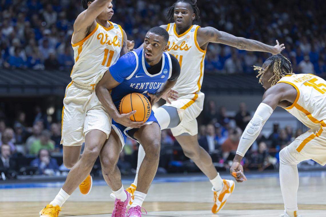 Kentucky’s Lamont Butler drives against Tennessee’s Jordan Gainey (11) during Friday’s Sweet 16 game at Lucas Oil Stadium in Indianapolis.