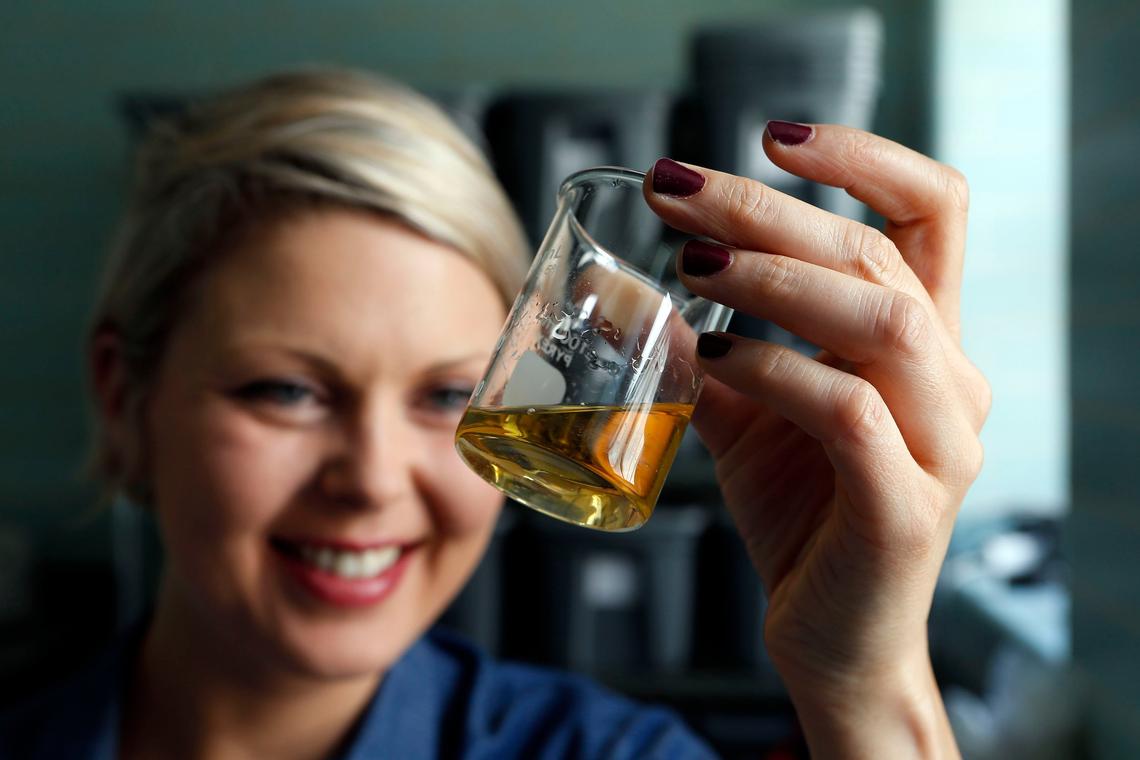Master Distiller Marianne Eaves held up a beaker of bourbon she distilled at the Castle & Key Distillery. It’s been aging about six months. The bourbon won’t be ready until 2021, she said last year. Eaves announced Monday she has left Castle & Key.