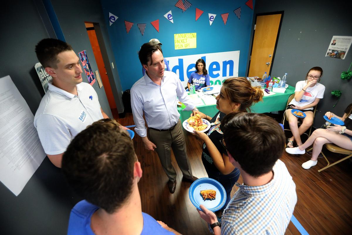 Democratic gubernatorial candidate Adam Edelen chatted with local campaign organizer Fiorella Salazar and other supporters Saturday evening as he celebrated their efforts with a pizza party at his Lexington campaign headquarters.