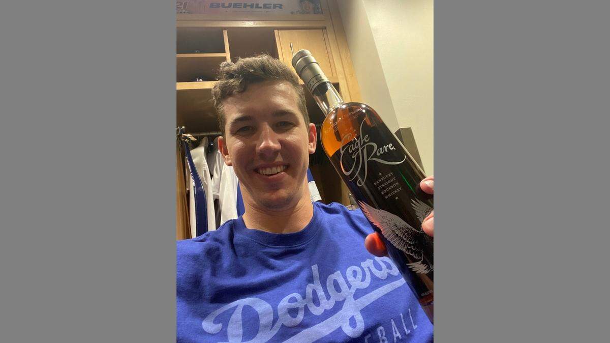 Walker Buehler was all smiles as he showed off his custom bottle of Eagle Rare bourbon.