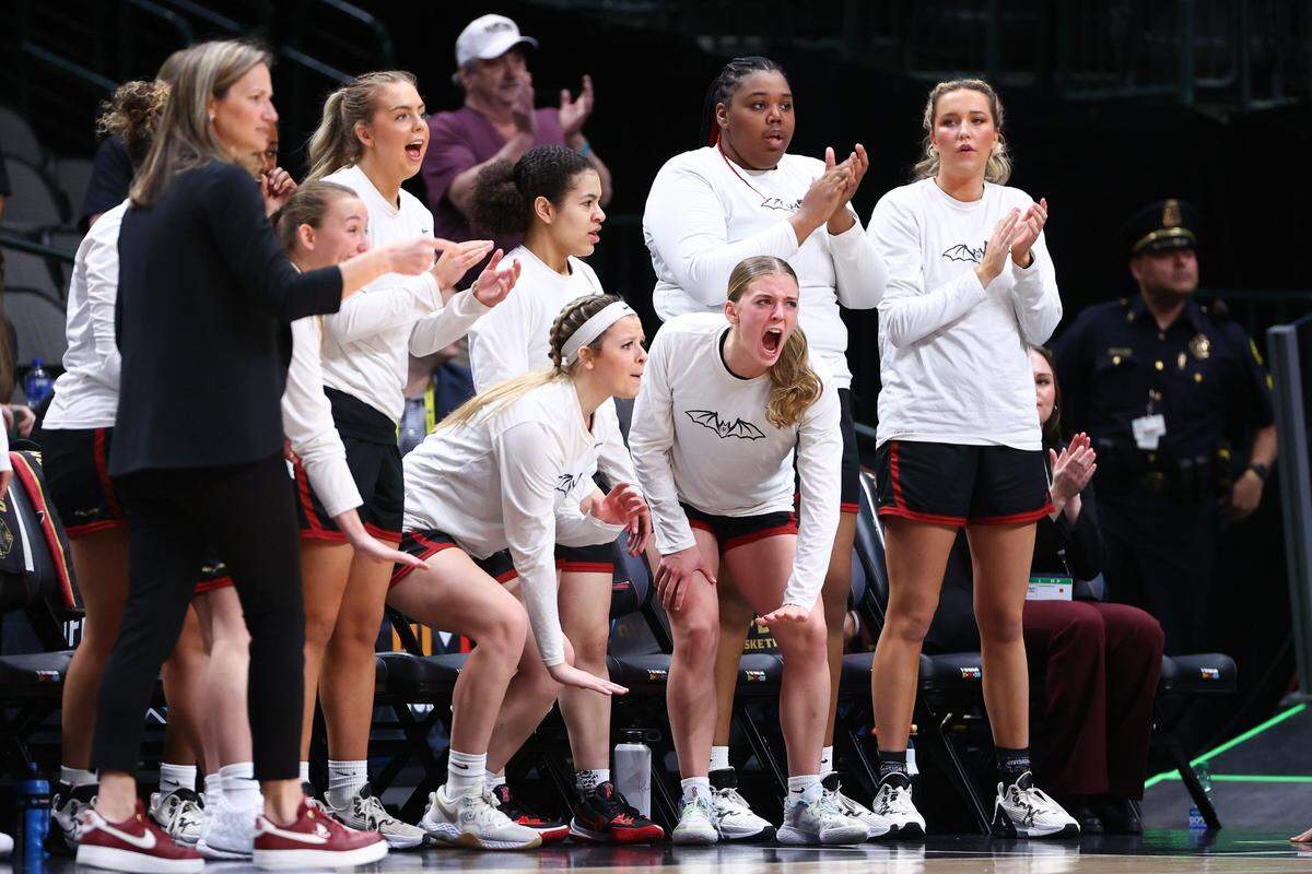 Members of the Transylvania women’s basketball team celebrate on the bench during the NCAA Division III Women’s Basketball Tournament championship game on Saturday, April 1, 2023, at the American Airlines Center in Dallas, Texas.