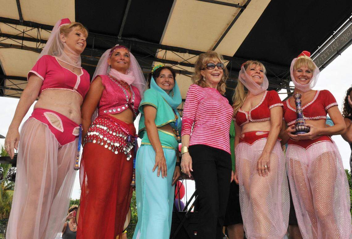 Barbara Eden on stage in 2015 with the finalists among the runners who dressed like Jeannie. Eden took part in the post race awards, and also received the keys to the city.Barbara Eden At Ron Jon Cocoa Beach Half Marathon