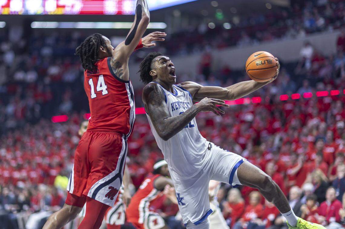 Kentucky center Amari Williams (22) shoots the ball as Mississippi guard Dre Davis (14) defends during Tuesday’s game in Oxford, Miss.
