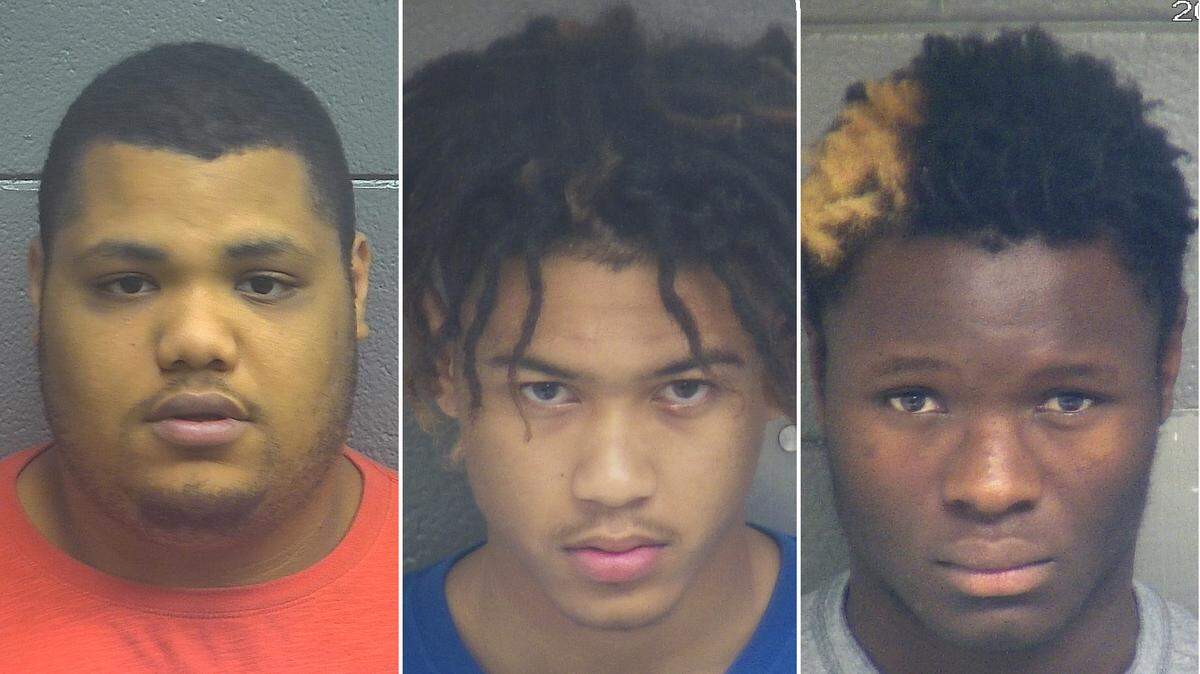 Rafael Brewster, left, Jah’Quez Crutchfield, center, and Moses Thompson